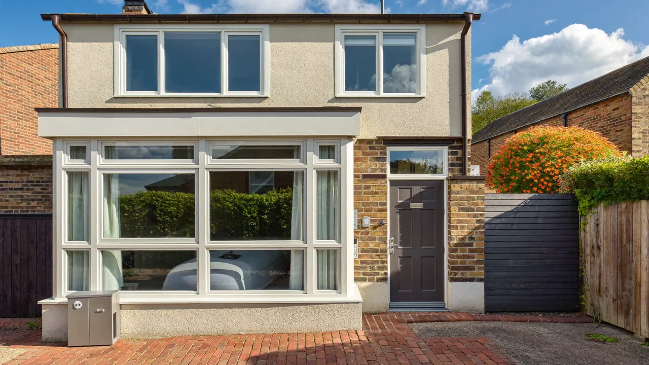 Freshly fitted double glazed windows on a UK house frontage
